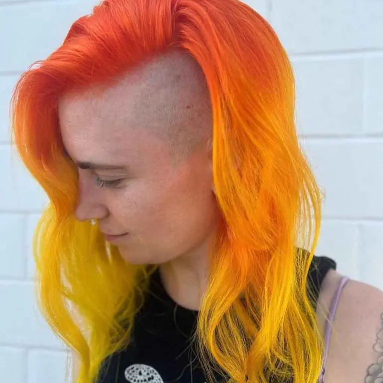 Half Shaved Buzz Cut With Medium Fire Hair Color