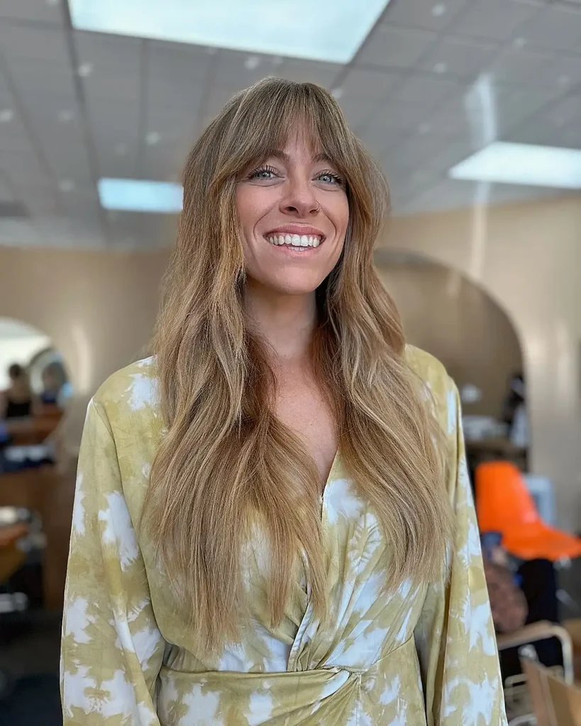 Long Malibu Blonde Wavy Wolf Cut With Curtain Bangs