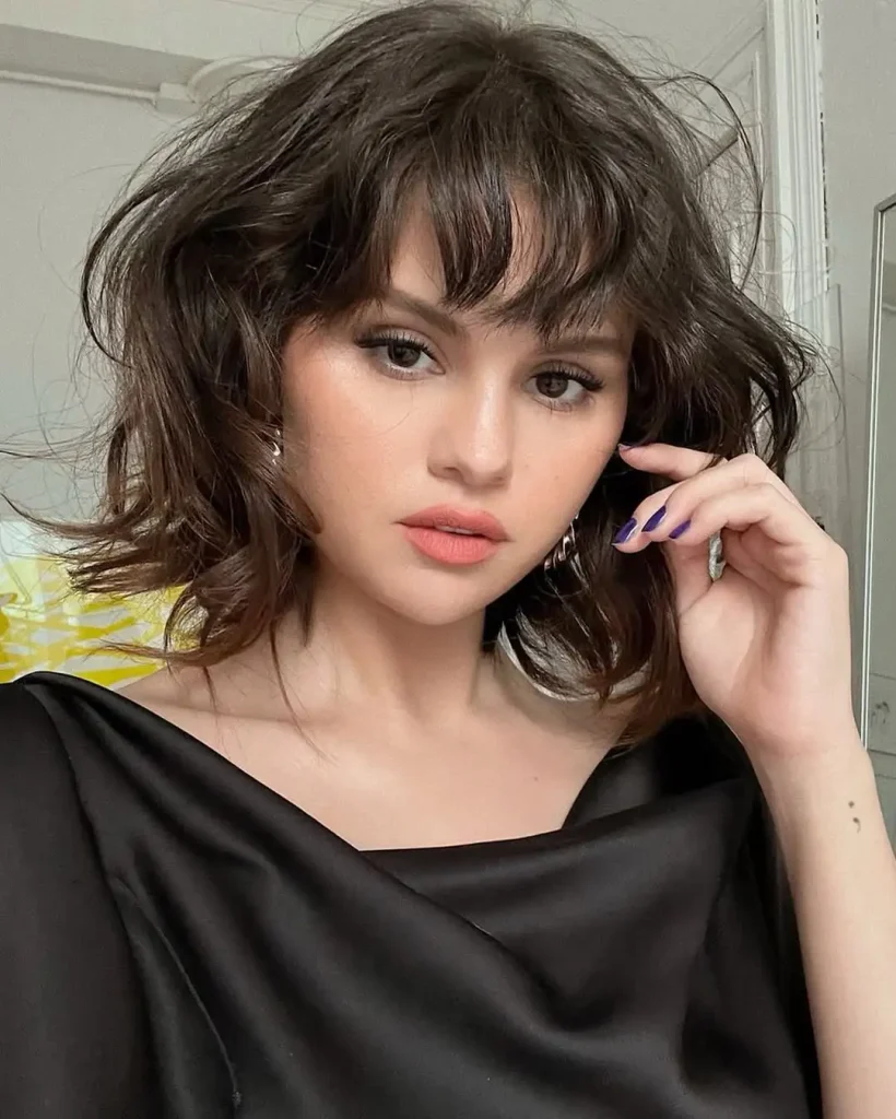 Messy Short Butterfly Cut Hairstyle with Tousled Waves