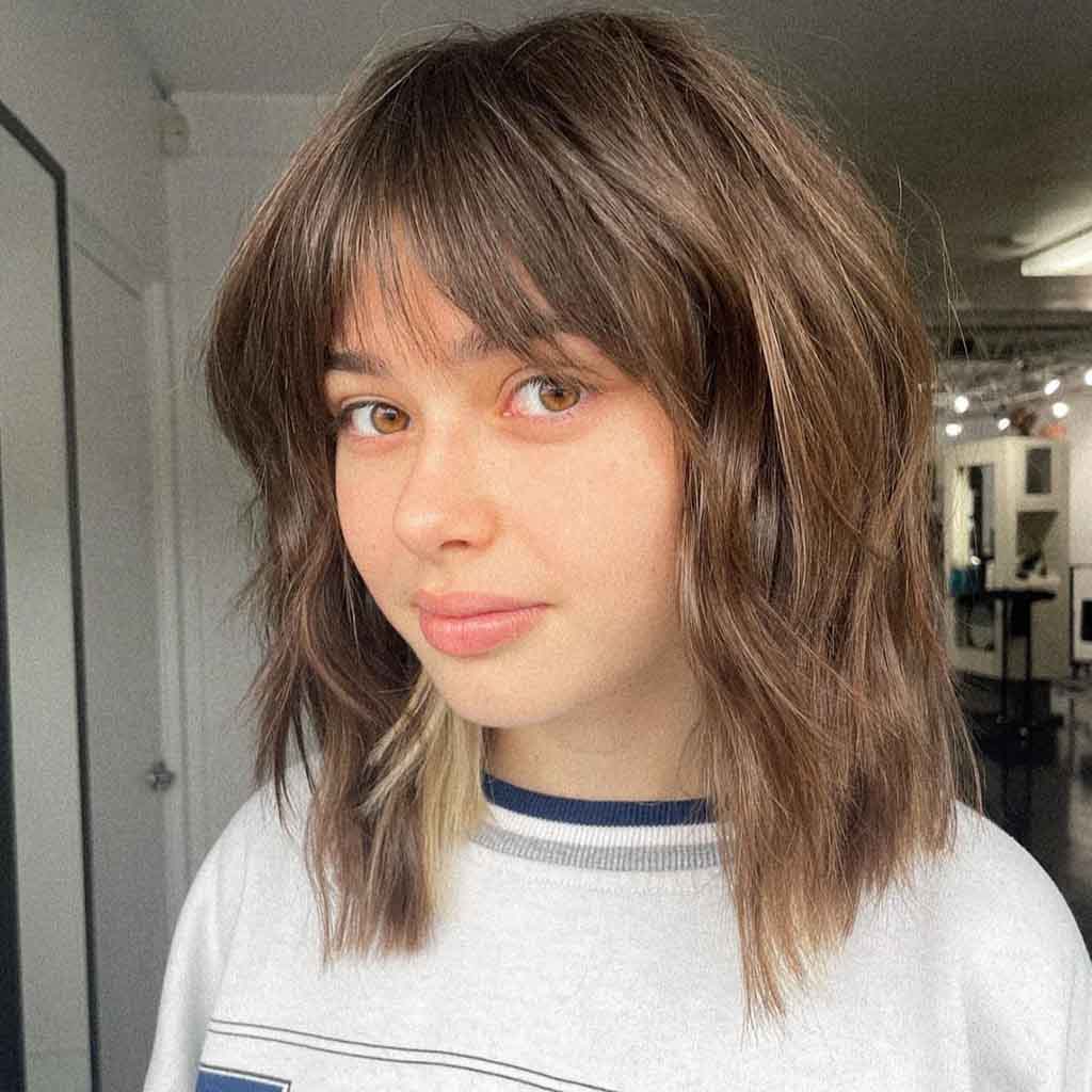 Modern Shaggy Lob on Brown Hair With Wispy Bangs