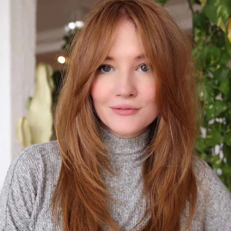 Face-Framing 90’s Shaggy Layered Haircut on Fluffy Ginger Hair