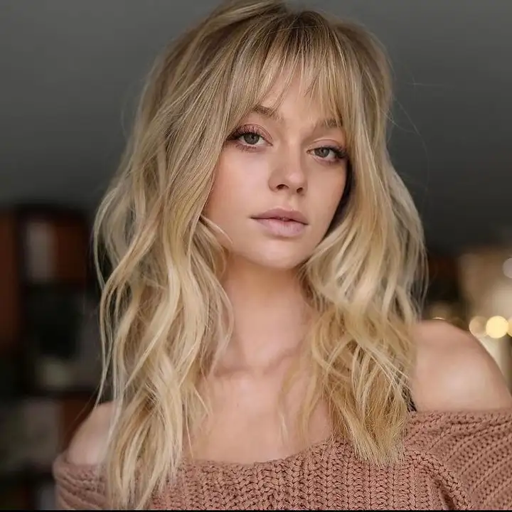 Long Blonde Octopus Wolf Cut with Choppy Bangs on Wavy Hair