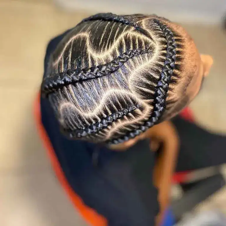Swirl Cornrows With Snake-Shaped Hair Partition