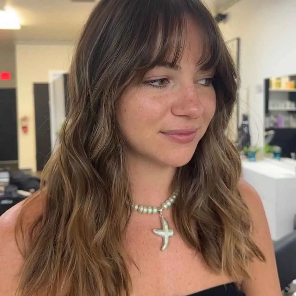 California Brunette Balayage With Bangs