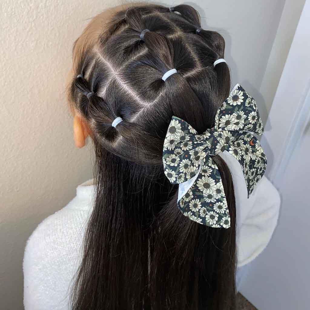 Half-Up Half-Down Braided Hairstyle With Bow