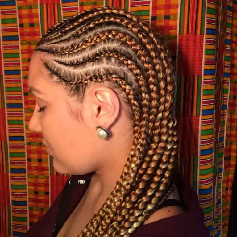 Side Swirl Braids With Copper Highlights