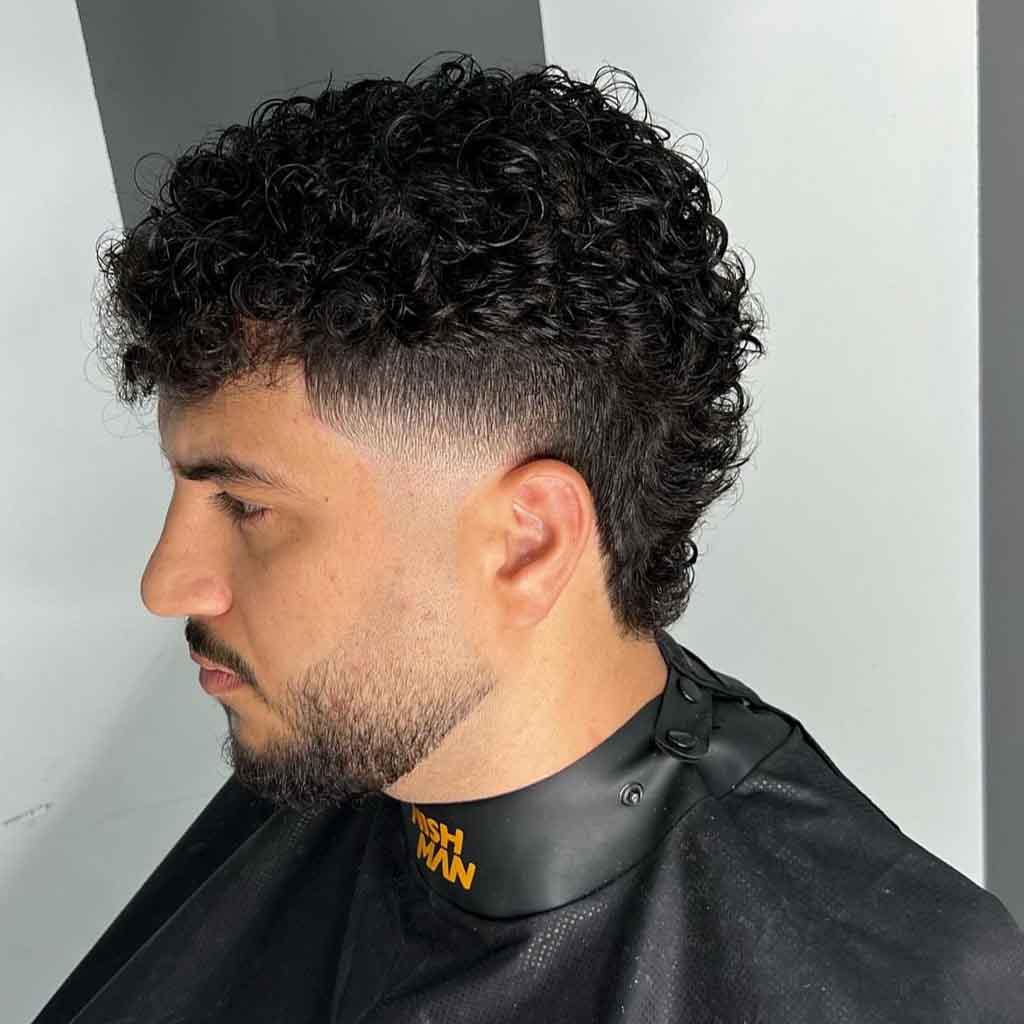13. Curly Mullet With French Crop Cut