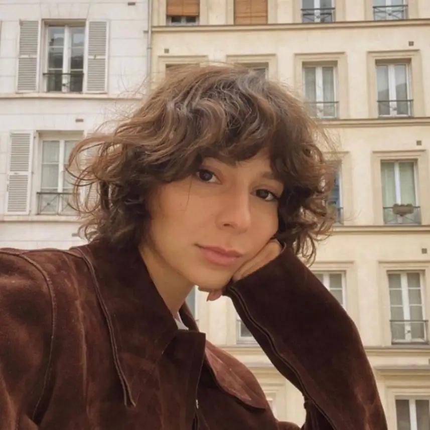 Short Curly Brown Shag Cut With Curly Curtain Bangs