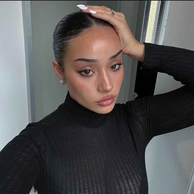 Sleek Gelled Bun on Black Hair