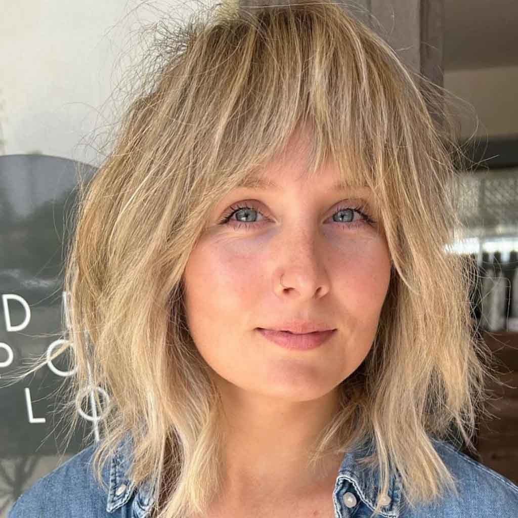 Messy Blonde Shaggy Lob With Face Framing Fringe