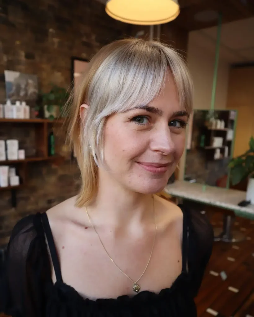 Pixie Wolf Cut With Curtain Bangs on Blonde Hair