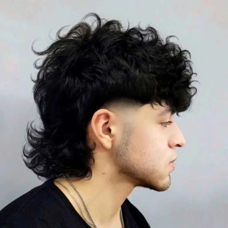 Wavy Mullet Wolf Cut With a Taper Fade