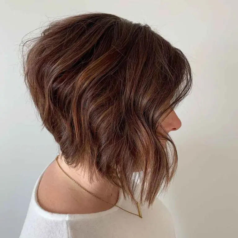Angled Bob Cut With Red and Caramel Highlights