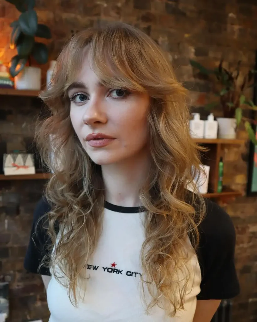 Blonde Wavy Medium Wolf Cut With Bottleneck Curtain Bangs