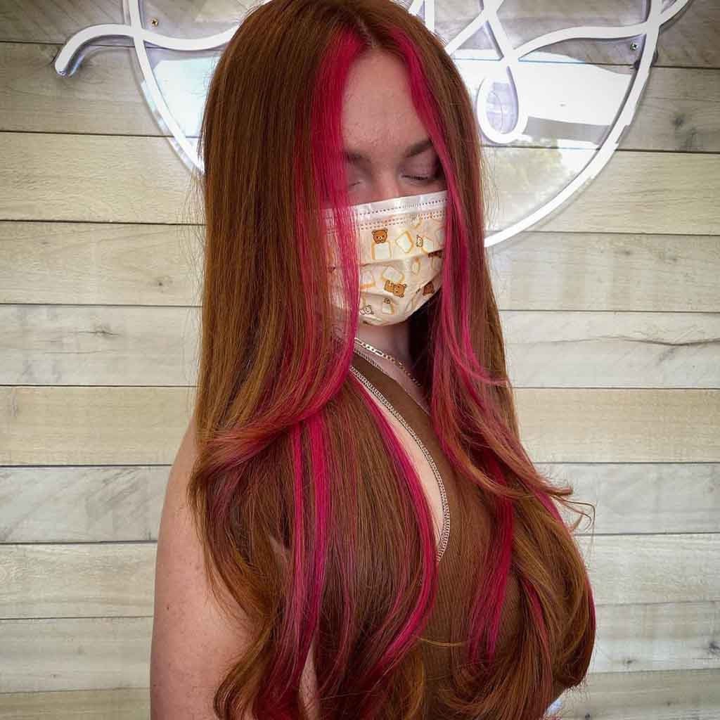 Long Ginger Layered Hair With Hot Pink Money Piece