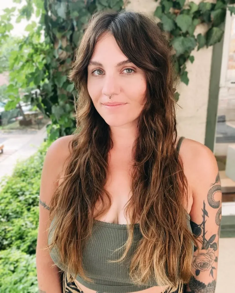 Wavy Wolf Cut With Curtain Bangs on Chocolate Brown Hair