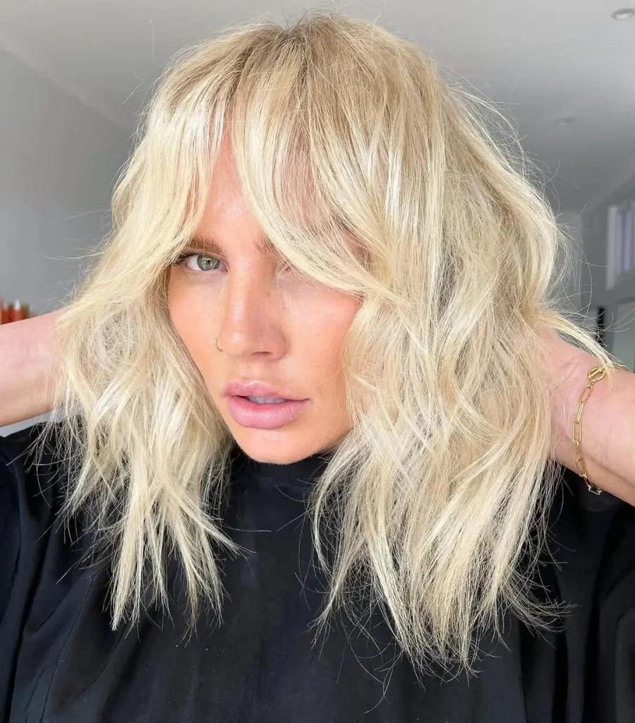 Blonde Shaggy Wolf Cut With Curtain Bangs