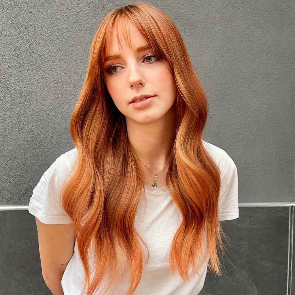 4. Long Wavy Ginger Hair With Light and Short Fringe 1