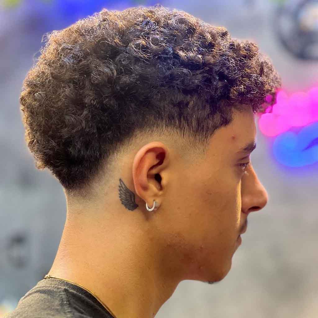 4. Short Curly Faded Mullet Cut