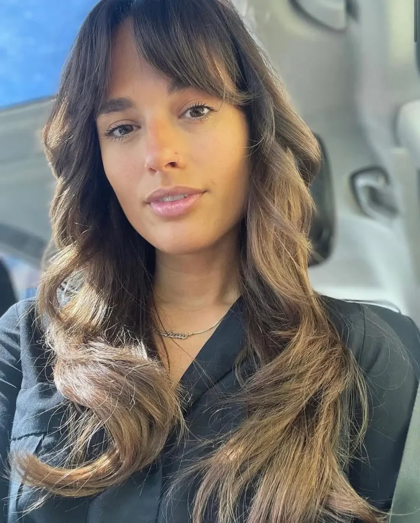 Wavy Golden Brown Wolf Cut With Curtain Bangs
