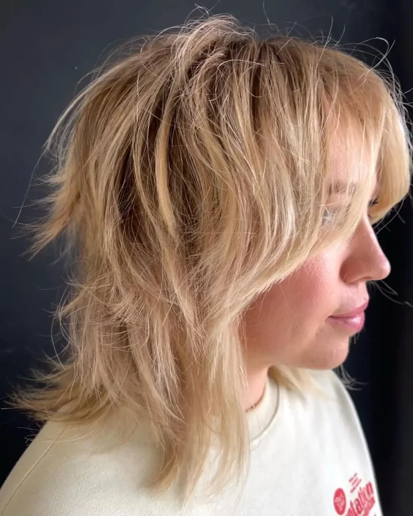 Messy Short Blonde Wolf Cut With Curtain Bangs