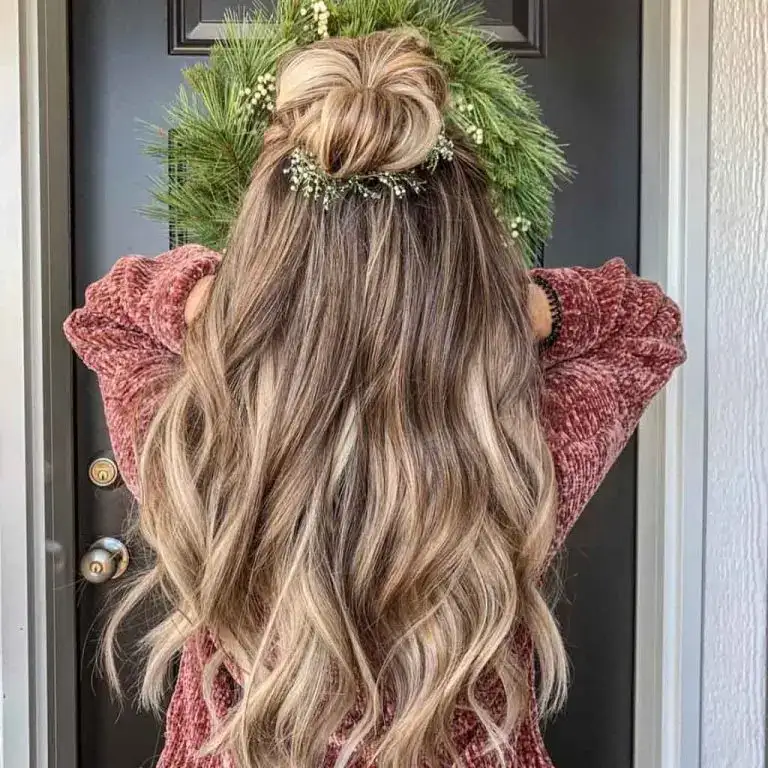 Long Wavy Bronde Hair With Top Knot Bun and Subtle Christmas Wreath