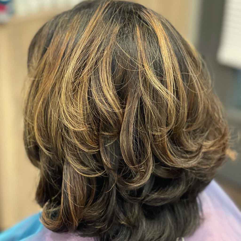 Short Brown Layered Hair With Golden Highlights