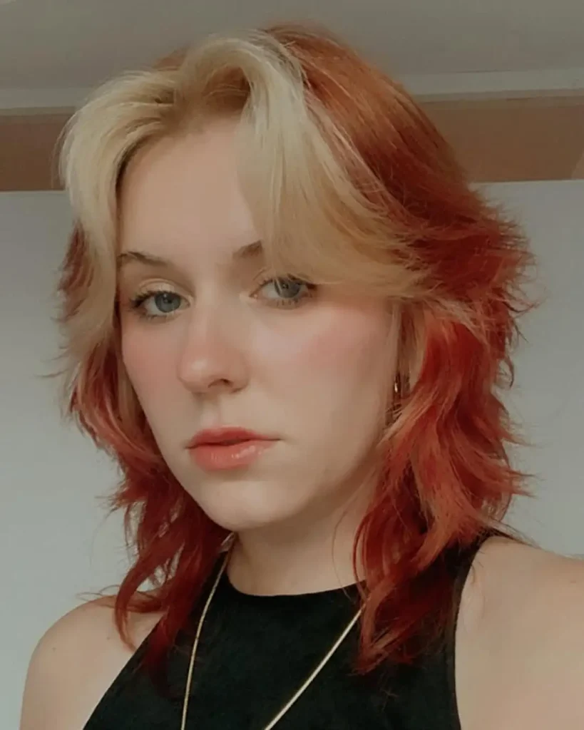 Short Ginger Wolf Cut With Blonde Curtain Bangs