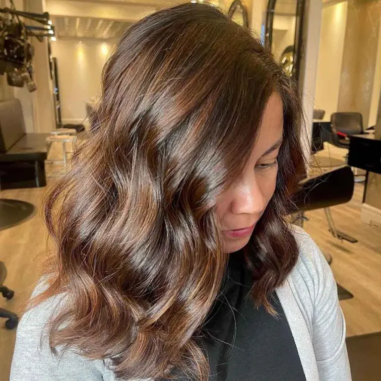 Wavy Brunette Hair With Warm Caramel Streaks