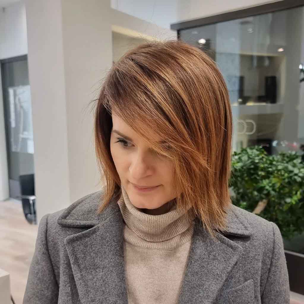 Bronze Balayage on Short Straight Hair With Side-Swept Bangs