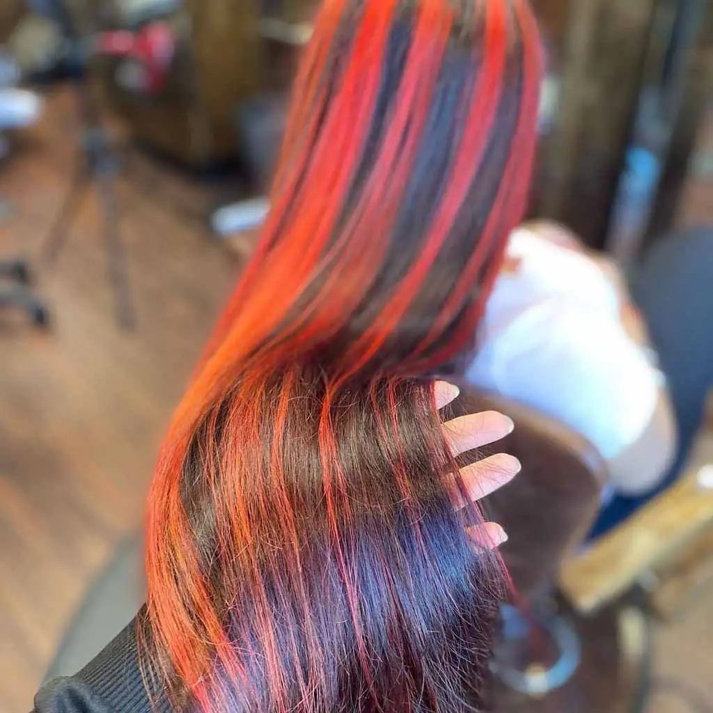 Long Black Hair With Bright Red Streaks