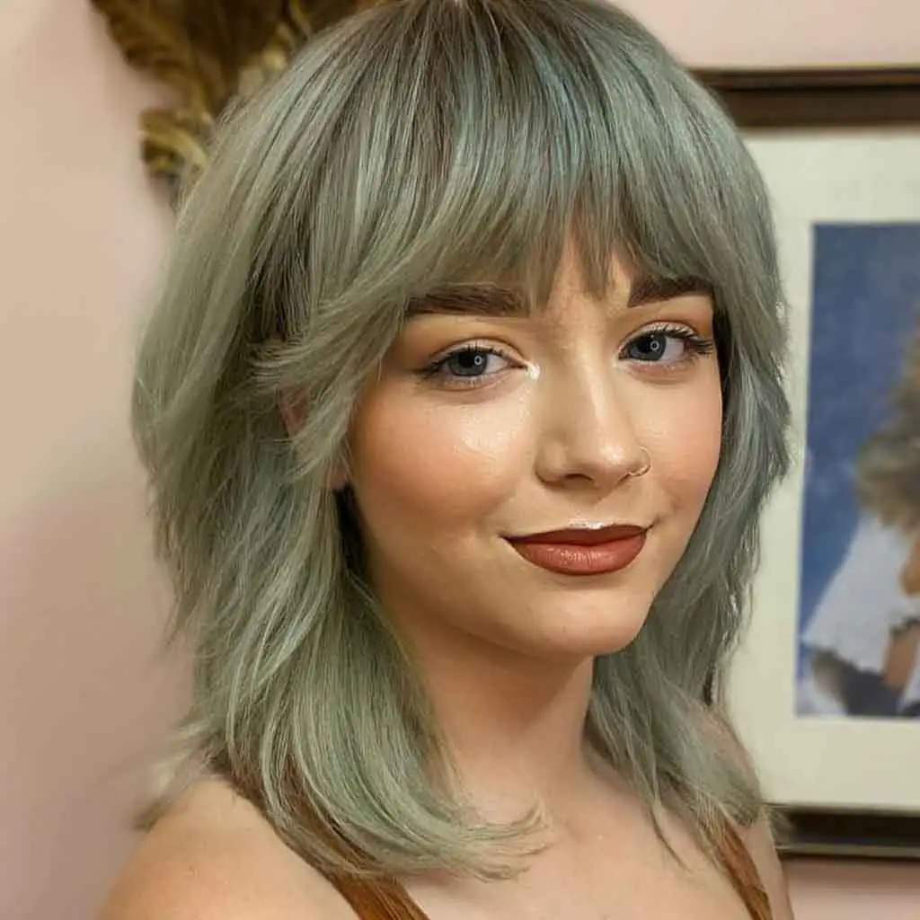 Medium Shag Cut With Bangs on Sage Green Hair