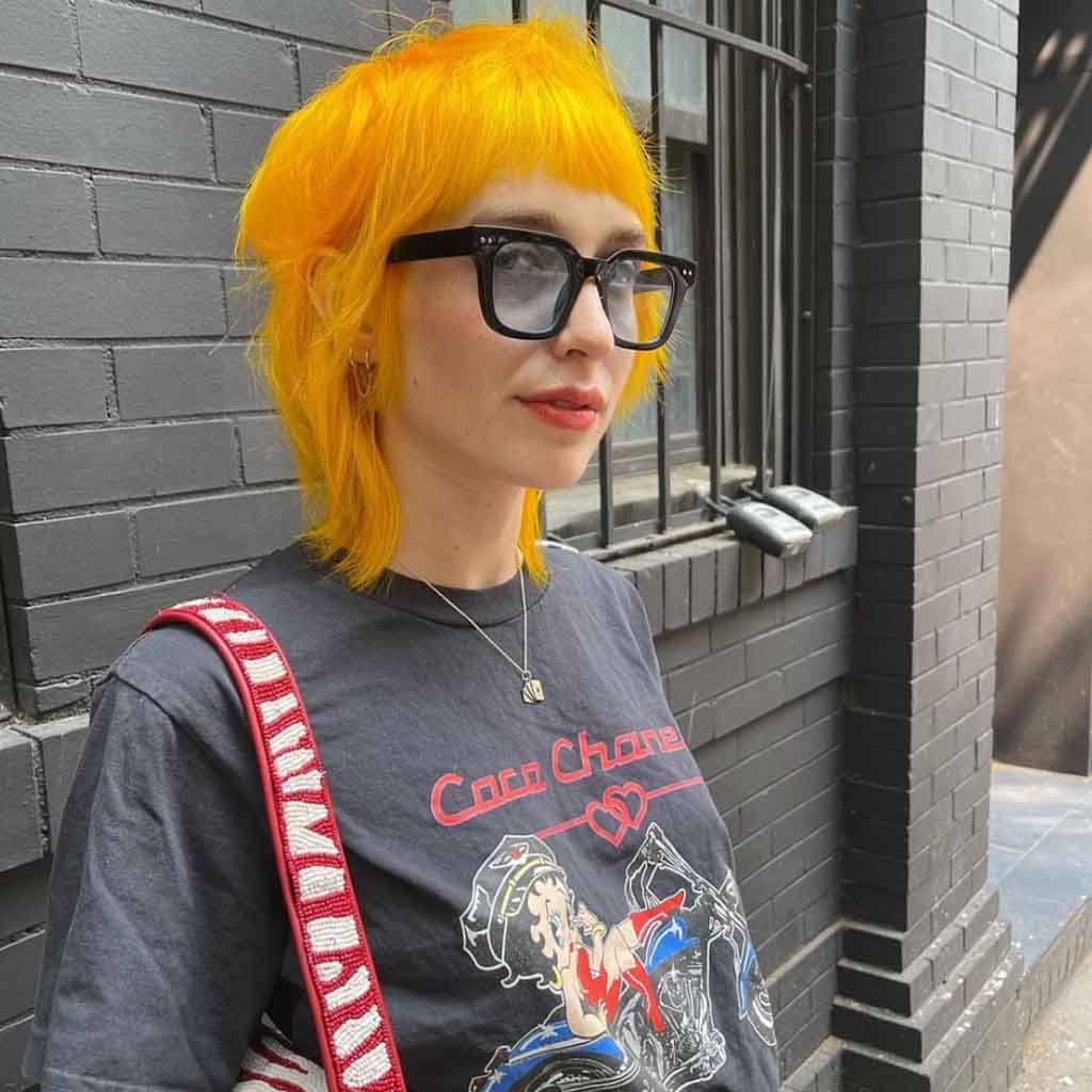 Soft Yellow Disheveled Shag With Short Blunt Bangs