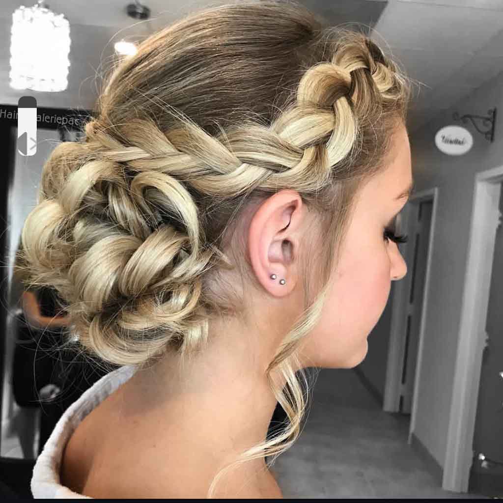 Braided Bun With Wavy Tendrils