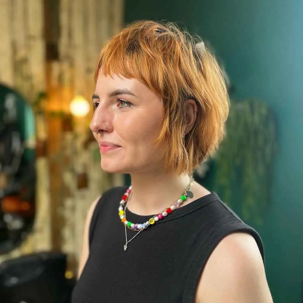 Razor Cut Shaggy Bob With Asymmetric Baby Bangs
