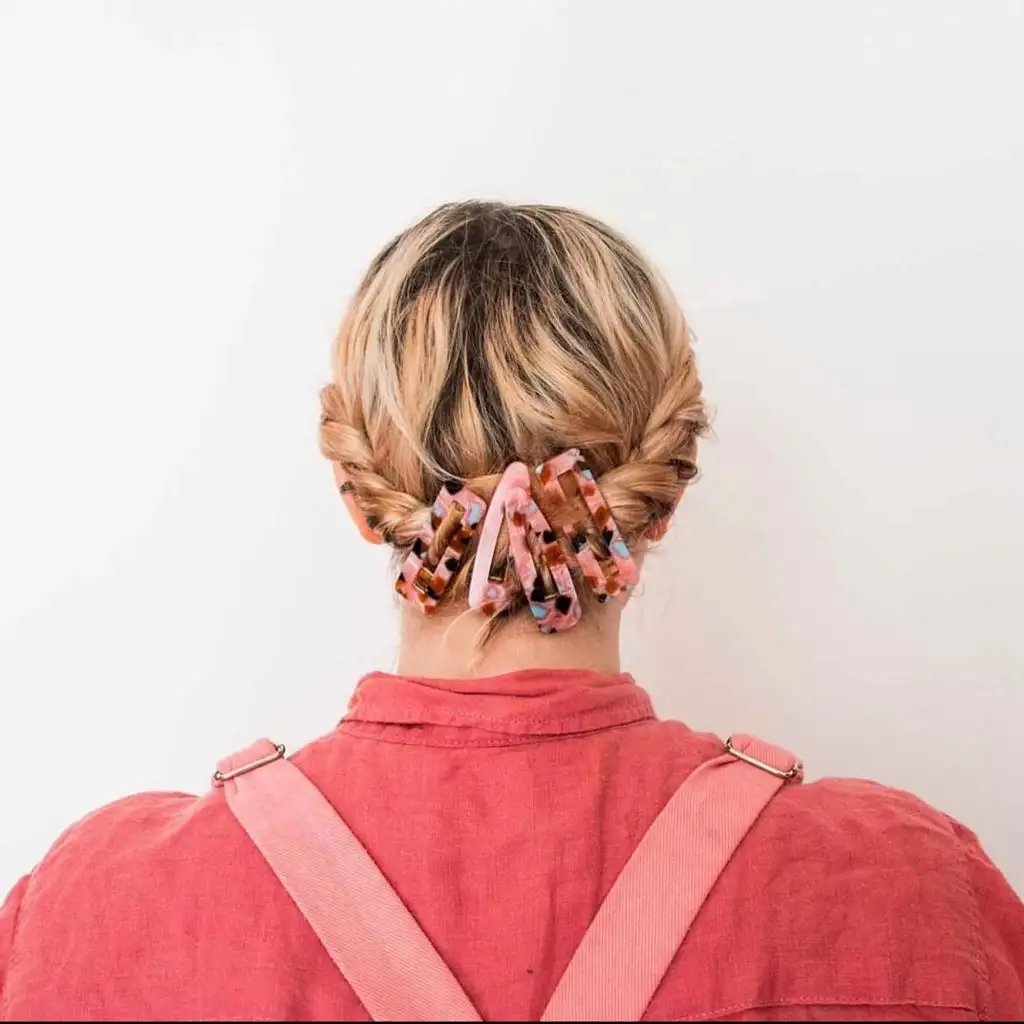 Short Blonde Hair Twisted Behind With Clips