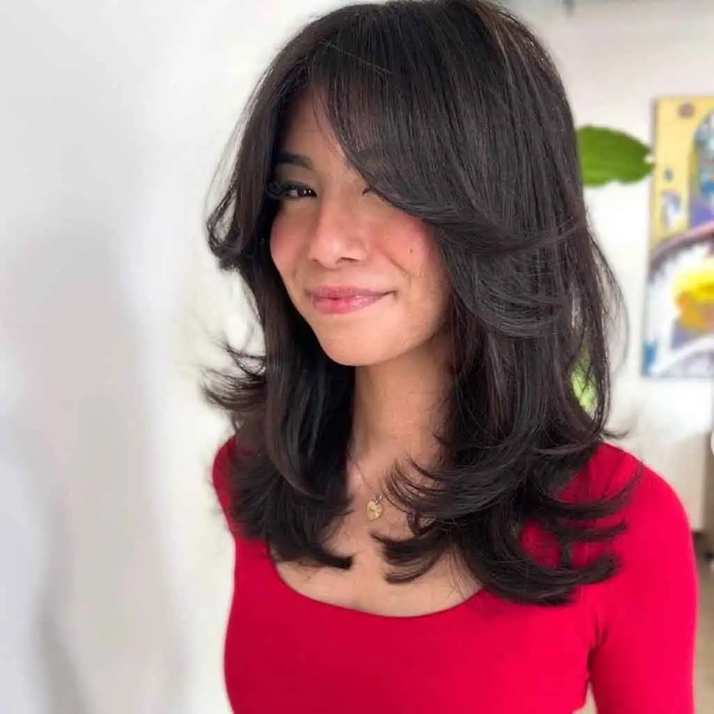 Black Kitty Cut With Side-Swept Bangs