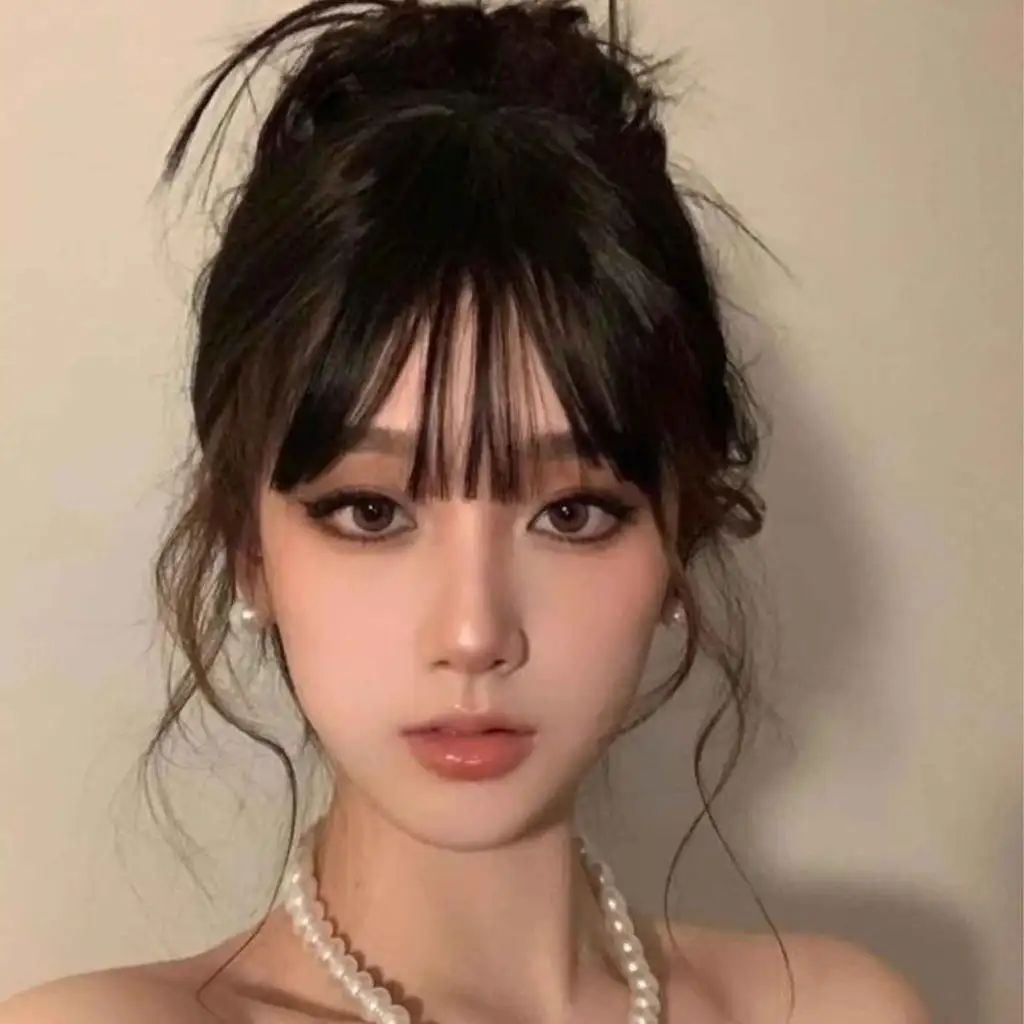 Korean Messy Bun Updo With Bangs