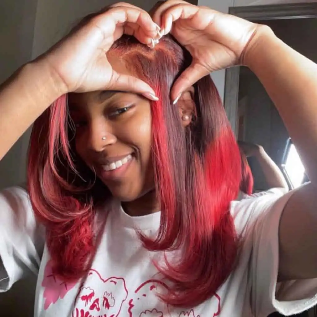 Medium Brown Hair With Heart Shaped Parting and Red Highlights