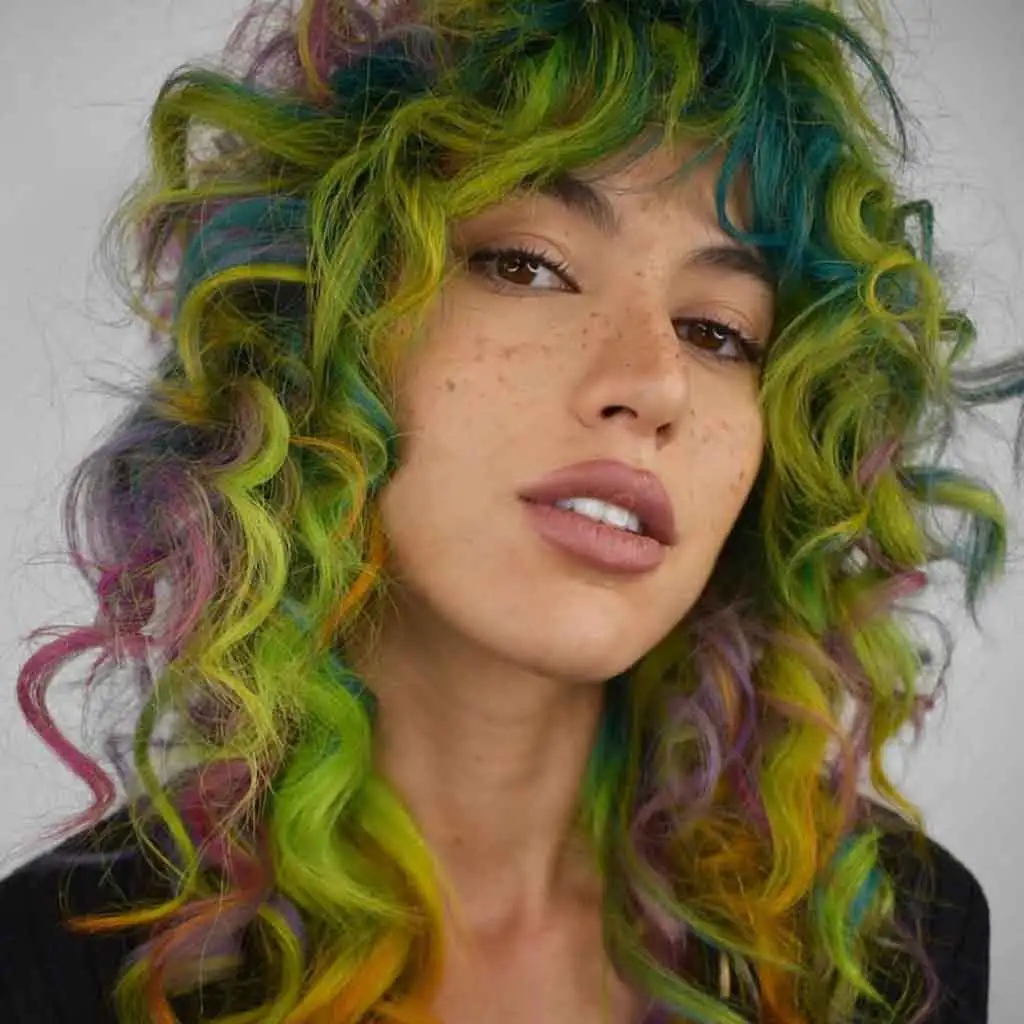 Multi-Colored Wavy Curly Shag Mullet Haircut With Asymmetric Bangs