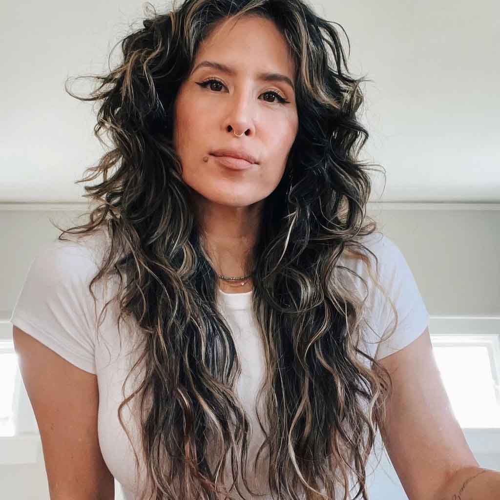 Choppy Layered Long Shag With Blonde Highlights