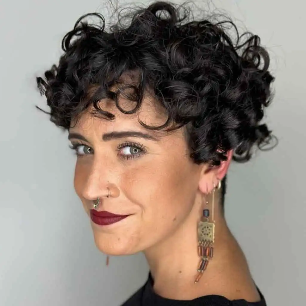 Undercut Curly Pixie With Flyaways