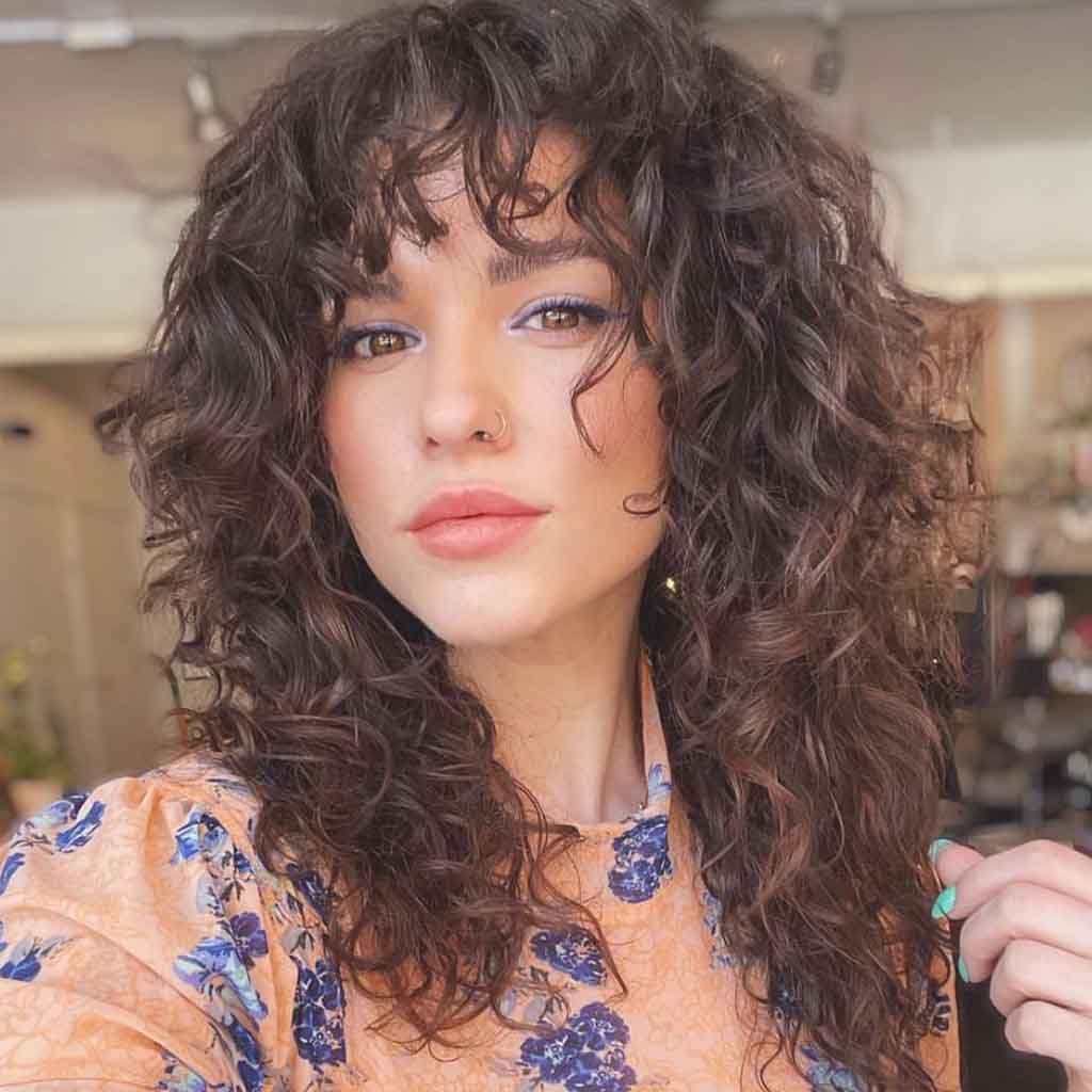 Curly Brown Fluffy Shaggy Cut With Wispy Bangs