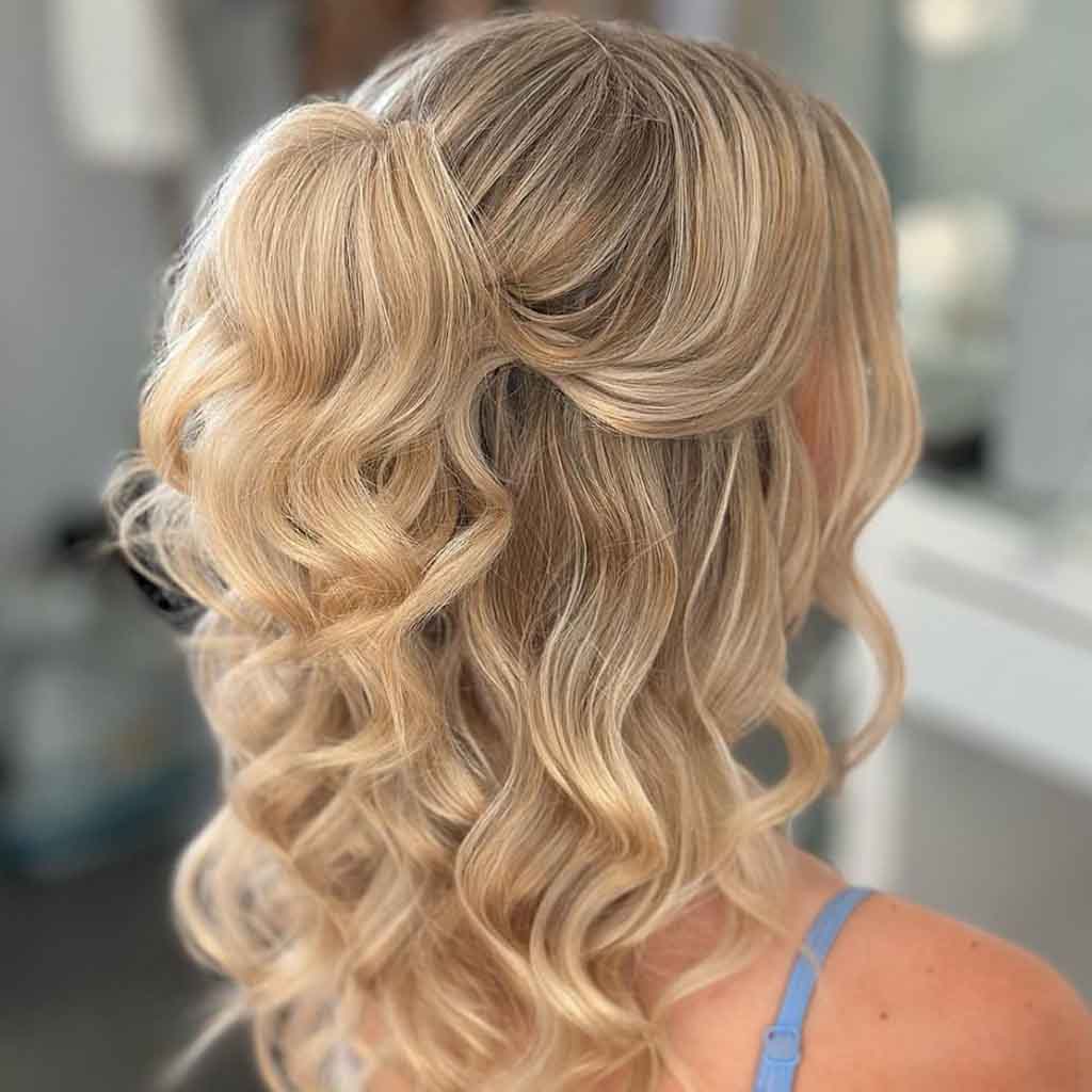 Medium Wavy Half-Up Half-Down Ponytail