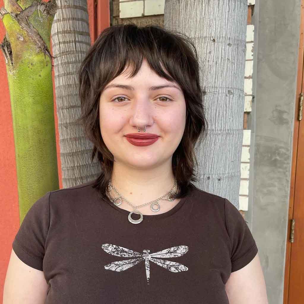 Short Shag Razor Cut With Asymmetric Bangs