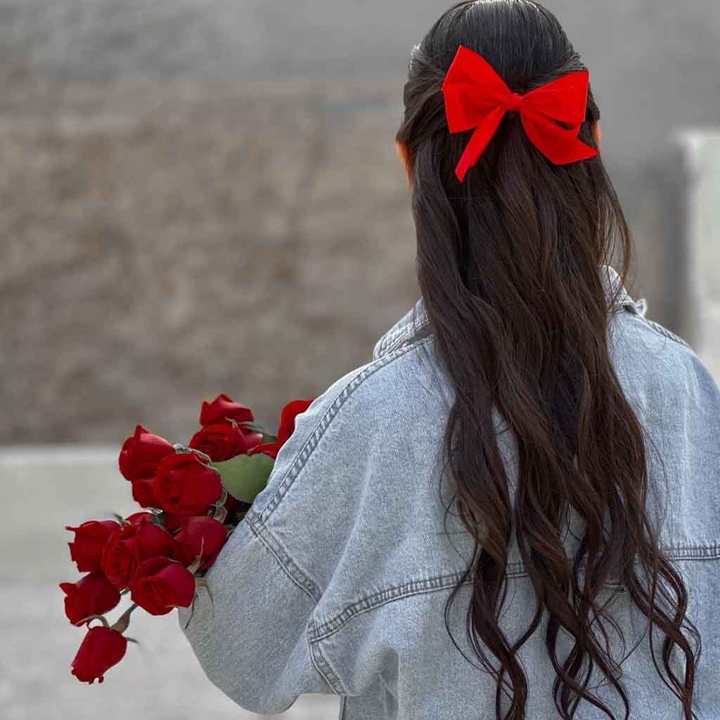 Long Brunette Hair With Tied With Red Bow