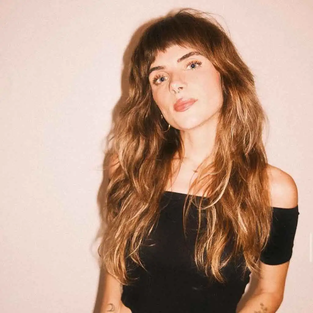 Long Wavy Golden Shag With Bangs