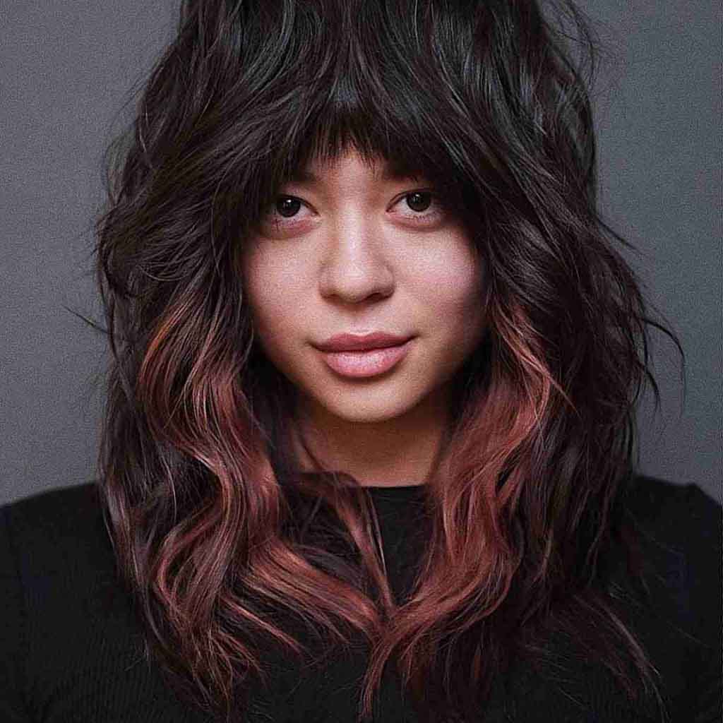 Modern Shaggy Wolf Cut With Face Framing Layers and Bangs