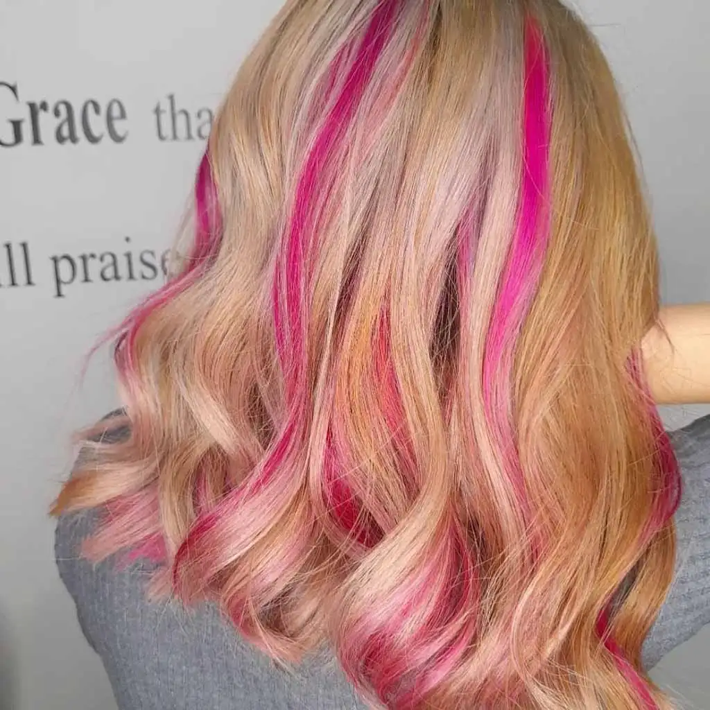 Medium Wavy Blonde Hair With Hot Pink Streaks