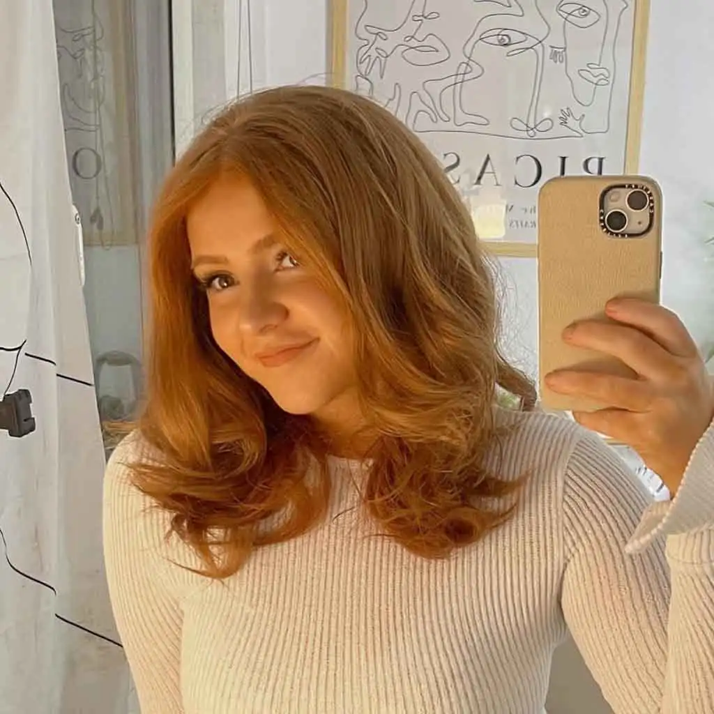 4. Classic Blonde Blowout Hair